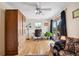 Bedroom with hardwood floors, view to deck, and built in wardrobe for storage at 1069 Crestmoor Dr, Boulder, CO 80303