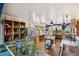 Spacious kitchen with stainless steel appliances, custom shelving, and tile accents at 1069 Crestmoor Dr, Boulder, CO 80303