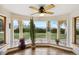 Charming sunroom with large windows and an abundance of natural light at 1069 Crestmoor Dr, Boulder, CO 80303