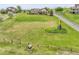 Expansive lot with mature trees and landscaping surrounding a beautiful single-Gathering home at 8236 S Ireland Way, Aurora, CO 80016