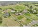Spacious property featuring mature trees and a beautifully landscaped yard from above at 8236 S Ireland Way, Aurora, CO 80016