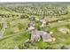 Aerial view showcasing a serene neighborhood with mature trees and expansive properties at 8236 S Ireland Way, Aurora, CO 80016