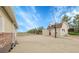 Well maintained backyard with basketball court and outbuildings great for hobbies or storage at 8236 S Ireland Way, Aurora, CO 80016