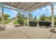 Covered patio featuring an outdoor kitchen area, perfect for entertaining at 8236 S Ireland Way, Aurora, CO 80016