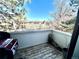 Balcony view with a grill, plants, and wood flooring offering an outdoor space to enjoy beautiful views at 46 S Nome St, Aurora, CO 80012