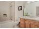 Well-lit bathroom with a shower-tub combo and vanity at 2521 Juniper Ct, Golden, CO 80401