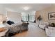 Spacious main bedroom with bay window seating area and decorative floral comforter set at 2521 Juniper Ct, Golden, CO 80401