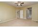 Large bedroom featuring an en suite bath and walk in closet at 12613 Knox Pt, Broomfield, CO 80020