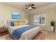 Comfortable bedroom with a ceiling fan and an abundance of natural light at 12613 Knox Pt, Broomfield, CO 80020