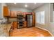 Spacious kitchen with stainless steel appliances and gorgeous countertops at 12613 Knox Pt, Broomfield, CO 80020