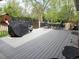 Relaxing deck area with outdoor seating and a grill, perfect for entertaining at 465 Salem St, Aurora, CO 80011