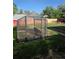 Backyard greenhouse with open door perfect for gardening enthusiasts at 465 Salem St, Aurora, CO 80011