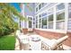 Outdoor patio area perfect for relaxation with stylish furniture and a brick wall at 6254 S Riviera Ct, Aurora, CO 80016