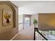 Upper hallway overlooking the main living area, providing an open and airy feel at 6254 S Riviera Ct, Aurora, CO 80016
