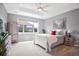 Serene main bedroom with large windows, neutral colors, and a cozy ambiance at 6254 S Riviera Ct, Aurora, CO 80016