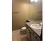 Bathroom featuring tile floors, neutral walls, toilet, vanity with granite top, sink, and a large mirror at 14096 E Radcliff Cir, Aurora, CO 80015