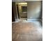 Bedroom featuring light-colored walls, hardwood floors, and a partial view into the bathroom with vanity and sink at 14096 E Radcliff Cir, Aurora, CO 80015
