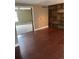 Spacious living room with wood floors and a view of another room at 14096 E Radcliff Cir, Aurora, CO 80015