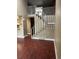 Stairway with white railing and carpeted steps that lead to a second floor at 14096 E Radcliff Cir, Aurora, CO 80015