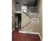 View of a home stairway with railing and access to the second level at 14096 E Radcliff Cir, Aurora, CO 80015