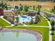 Resort-style community pool, perfect for relaxation and recreation with lush landscaping and seating areas at 1125 Anker Dr, Erie, CO 80516