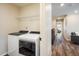 Convenient laundry room with modern washer and dryer units at 1125 Anker Dr, Erie, CO 80516