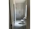Bright bathroom features a glass enclosed shower and modern vanity at 5841 Powell Rd, Parker, CO 80134