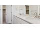 Modern bathroom featuring double sinks and a well-lit mirror, providing a functional and stylish space at 14125 Deertrack Ln, Parker, CO 80134