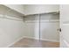 A walk-in closet with carpeted floors and shelving for optimal organization at 14125 Deertrack Ln, Parker, CO 80134