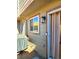 Back porch view of the home featuring outdoor grill, sliding glass door, and exterior lighting at 886 Summer Dr, Highlands Ranch, CO 80126