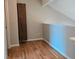 Bedroom area with hardwood floors and closet at 886 Summer Dr, Highlands Ranch, CO 80126