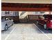 Carport with two parking spots marked with visible numbers on the concrete at 886 Summer Dr, Highlands Ranch, CO 80126
