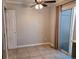 Bright dining room featuring tile floors, ceiling fan and sliding glass door at 886 Summer Dr, Highlands Ranch, CO 80126