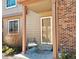 Inviting front porch with chair, perfect for enjoying the outdoors at 886 Summer Dr, Highlands Ranch, CO 80126