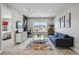 Versatile sitting area or office with a desk, TV, and comfortable seating at 745 Penstemon Dr, Henderson, CO 80640