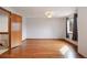 Bedroom featuring gleaming hardwood floors, a ceiling fan, and a window at 5596 S Urban St, Littleton, CO 80127