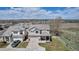 Expansive aerial view of a lovely home with a large yard in a serene neighborhood setting at 19593 E Hollow Creek Dr, Parker, CO 80134