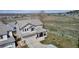 Aerial view showcasing a well-situated home with a spacious yard and neighborhood surroundings at 19593 E Hollow Creek Dr, Parker, CO 80134