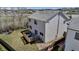 Spacious backyard with a wooden deck, fenced perimeter, and well-maintained lawn at 19593 E Hollow Creek Dr, Parker, CO 80134