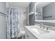Updated bathroom featuring a subway tile shower and modern vanity at 19593 E Hollow Creek Dr, Parker, CO 80134
