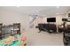 Finished basement featuring an open floor plan, perfect for a home gym and recreation area at 6760 Mariposa Ct, Denver, CO 80221