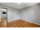 Bedroom with hardwood floors and neutral paint at 4660 E Briarwood Pl, Centennial, CO 80122