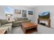 Cozy living room features carpet, natural light, and a relaxing atmosphere with comfortable seating at 6055 Point Rider Cir, Castle Rock, CO 80104