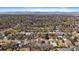 Expansive aerial view showcases the neighborhood with scenic mountain backdrop in the distance at 1746 Shavano St, Longmont, CO 80504