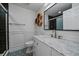 Elegant bathroom with marble vanity and modern fixtures at 1746 Shavano St, Longmont, CO 80504