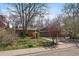Single-story home with a brick exterior, two-car garage and a manicured front lawn at 1746 Shavano St, Longmont, CO 80504