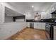 Well-equipped kitchen with stainless steel appliances and granite countertops at 1746 Shavano St, Longmont, CO 80504