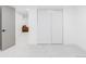 Basement doorway opening to a finished basement with a casual seating area at 6211 W Fremont Pl, Littleton, CO 80128