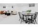 Finished basement featuring a casual seating area and table with chairs at 6211 W Fremont Pl, Littleton, CO 80128