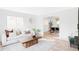 Bright and airy living room featuring contemporary décor and natural light at 6211 W Fremont Pl, Littleton, CO 80128
